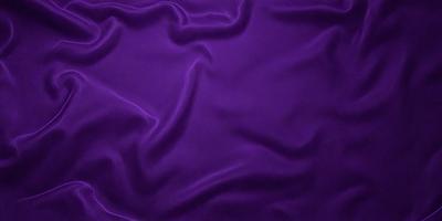 Purple fabric with a pattern of swirls and waves.