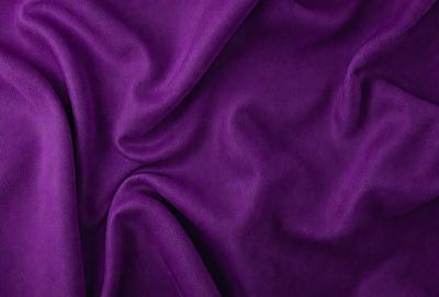 Purple fabric, possibly silk, with a purple background.