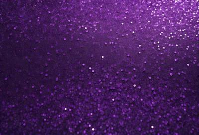 Purple glittery background with purple glittery dots.