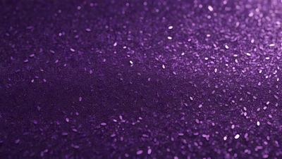 Purple glittery background with purple glittery specks.