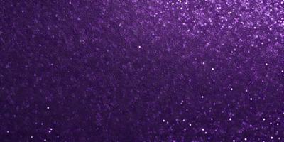 Purple glittery background with purple glittery stars.