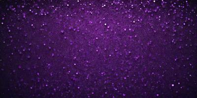 Purple glittery background with purple glittery stars.