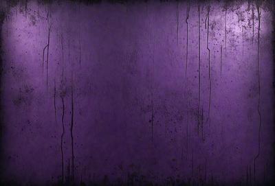 Purple wall with paint drips.