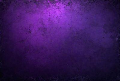 Purple wall with purple and white spots.