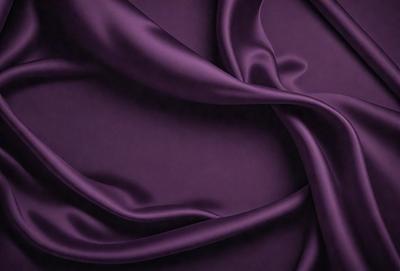 Purple fabric with a flowing texture.