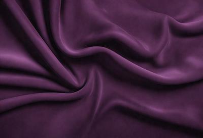 Purple fabric with a flowing pattern.