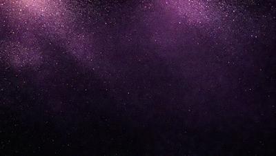 The image features a dark, purple sky with a few stars scattered throughout. The primary subject is the night sky, which is the setting and background of the image. The visual style is a photo, capturing the beauty of the night sky. The colors and mood of the image are predominantly dark and moody, with the purple hue adding a sense of mystery to the scene.