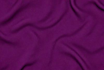 Purple fabric with a pattern of waves.