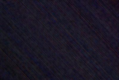 The primary subject of the image is a black background with a pattern of blurred lines. The setting is a dark room, and the visual style appears to be a digital art or illustration. The colors and mood of the image are predominantly dark and moody, with the black background and blurred lines creating a sense of depth and intrigue.
