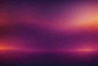 The primary subject of the image is a purple sky with a pink hue. The setting is a dark, cloudy sky, creating a moody atmosphere. The visual style appears to be a photo, as it captures the natural beauty of the sky. The colors and mood of the image evoke a sense of mystery and tranquility.