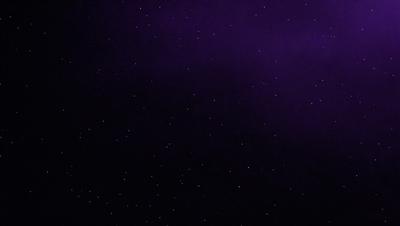 The primary subject of the image is a purple sky filled with bright stars. The setting is a nighttime sky, and the visual style appears to be a photo of the night sky. The colors and mood of the image are predominantly purple and dark, creating a serene and peaceful atmosphere.
