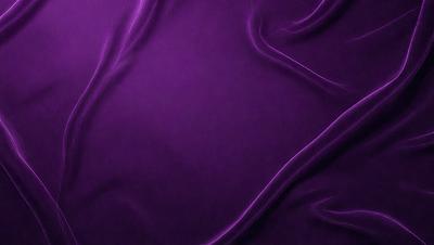 Purple fabric with a pattern of swirls and curved lines.