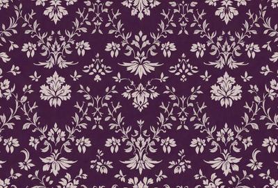 The primary subject of the image is a purple floral pattern, which is the main object, scene, or focus of the image. The setting or background is a purple fabric, and the visual style is a pattern. The colors and mood of the image are predominantly purple, creating a calm and serene atmosphere.