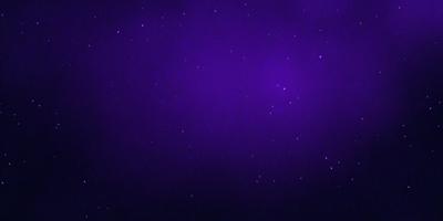 The image features a purple sky with a few stars scattered throughout the scene. The primary subject is the night sky, which is the main focus of the image. The setting is a dark, star-filled night, and the visual style is a natural, outdoor environment. The colors and mood of the image are predominantly purple, creating a serene and peaceful atmosphere.