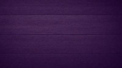Purple wall with a wooden texture.