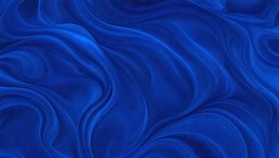 The primary subject of the image is a blue ocean with waves. The setting is the ocean, and the visual style is a photo. The dominant colors are blue and white, creating a serene and calming atmosphere.