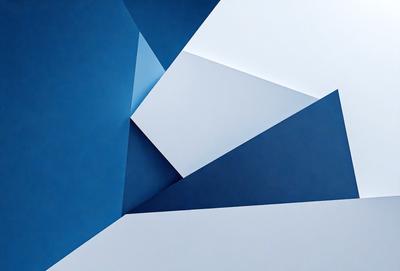 The primary subject of the image is a blue wall with a white triangle on it. The setting is a room with a blue background. The visual style is a combination of digital art and illustration. The dominant colors are blue and white, creating a calm and soothing atmosphere.