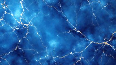 The primary subject of the image is a blue marble wall with a pattern of yellow streaks. The setting is a room with a blue background, and the visual style is a close-up of the marble wall. The dominant colors are blue and yellow, creating a calming and serene atmosphere.