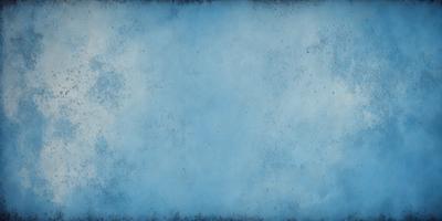 The primary subject of the image is a large, blue, cloudy sky. The setting is a cloudy day, and the visual style is a photo. The colors and mood of the image are predominantly blue, creating a calm and serene atmosphere.