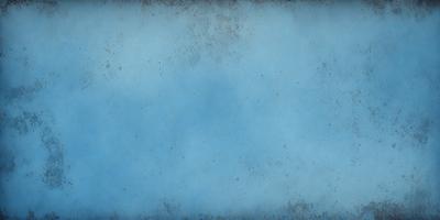 The primary subject of the image is a blue sky with a few white clouds. The setting is a cloudy day, and the visual style is a photo. The colors and mood of the image are predominantly blue and calm, creating a serene atmosphere.