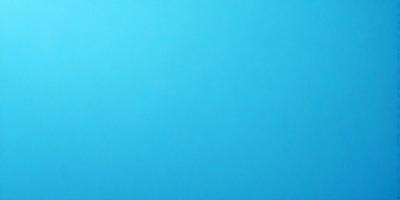 The primary subject of the image is a large, empty blue sky. The setting is a vast, open space with no visible landmarks or objects. The visual style is a natural, untouched landscape. The colors and mood are predominantly blue, creating a serene and peaceful atmosphere.