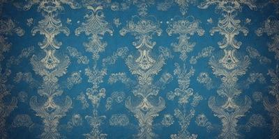 The primary subject of the image is a blue and white floral patterned wallpaper. The setting is a room with a blue background, and the visual style is a close-up of the wallpaper. The colors and mood of the image are predominantly blue and white, creating a calm and serene atmosphere.
