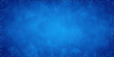The primary subject of the image is a blue sky with clouds. The setting is a cloudy day, and the visual style is a photo. The dominant colors are blue and white, creating a calm and serene atmosphere.