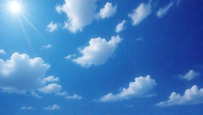 The primary subject of the image is a cloudy blue sky filled with various cloud formations. The setting is a vast, open sky, and the visual style is a natural, outdoor atmosphere. The colors and mood of the image are predominantly blue and serene, with the clouds adding a sense of depth and movement to the scene.