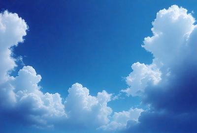 The primary subject of the image is a cloudy blue sky with a few white clouds scattered throughout. The setting is a clear day with a blue sky, and the visual style is a natural, outdoor scene. The colors and mood of the image are predominantly blue and serene, creating a peaceful atmosphere.