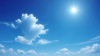 The primary subject of the image is a cloudy blue sky with a few clouds scattered throughout. The setting is a clear day with a sunny atmosphere. The visual style is a natural, outdoor scene. The colors and mood are predominantly blue and sunny, creating a serene and peaceful environment.