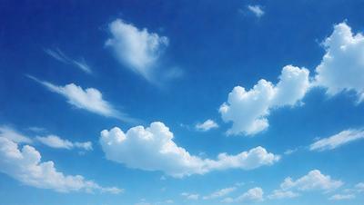 The primary subject of the image is a cloudy blue sky filled with various cloud formations. The setting is a clear day with a bright blue sky, and the visual style is a natural, outdoor scene. The colors and mood of the image are predominantly blue and serene, creating a peaceful atmosphere.