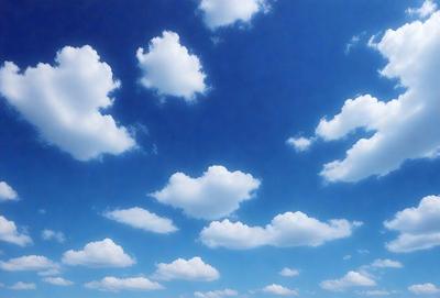 The primary subject of the image is a cloudy blue sky filled with numerous white clouds. The setting is a vast, open sky, and the visual style is a natural, outdoor atmosphere. The colors and mood of the image are predominantly blue and white, creating a serene and peaceful ambiance.