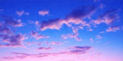 The primary subject of the image is a beautiful, cloudy sky. The setting is a sunset, with the sky filled with clouds and a warm, pink hue. The visual style is a natural, outdoor scene, with no indication of being a photo, digital art, illustration, drawing, pattern, texture, or clipart. The colors and mood of the image are serene and peaceful, with the clouds and pink hue creating a calming atmosphere.