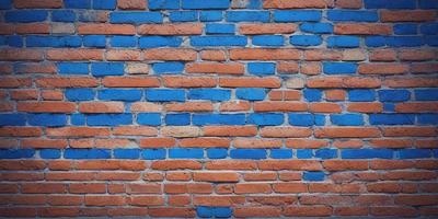 The primary subject of the image is a blue brick wall. The setting is a brick wall with a blue and orange color scheme. The visual style is a close-up of the brick wall, showcasing its texture and design. The colors and mood of the image are vibrant and energetic, with the blue and orange tones creating a lively atmosphere.