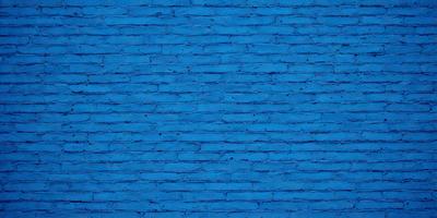 The primary subject of the image is a blue brick wall. The setting is a brick wall, and the visual style is a photo. The dominant colors are blue and white, creating a calm and serene atmosphere.
