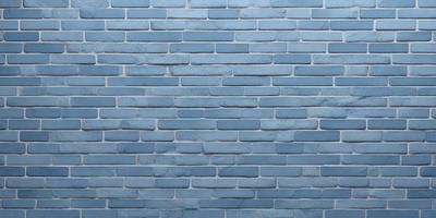 The primary subject of the image is a blue brick wall. The setting is a room with a blue brick wall as the main focus. The visual style is a photo, and the dominant colors are blue and gray. The overall atmosphere is calm and serene.
