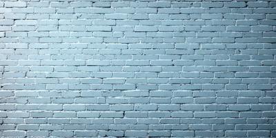 The primary subject of the image is a blue brick wall. The setting is a brick wall, and the visual style is a photo. The dominant colors are blue and white, creating a calm and serene atmosphere.