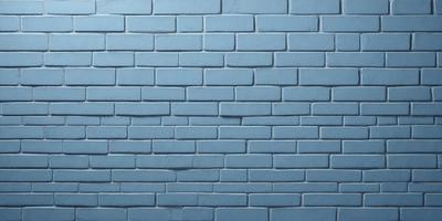 The primary subject of the image is a blue brick wall. The setting is a brick wall, and the visual style is a photo. The dominant colors are blue and white, creating a calm and serene atmosphere.