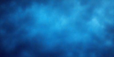 The primary subject of the image is a blue sky with clouds. The setting is a cloudy day, and the visual style is a photo. The dominant colors are blue and white, creating a calm and serene atmosphere.