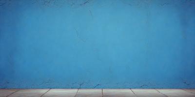 The primary subject of the image is a blue wall with a cracked and chipped appearance. The setting is a room with a wooden floor. The visual style is a photo, and the dominant colors are blue and white. The overall atmosphere is somewhat distressed and aged, possibly suggesting a vintage or aged aesthetic.