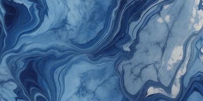 The primary subject of the image is a blue and white marbled surface, which appears to be a piece of marble or a marbled wall. The setting is a room with a blue and white marbled wall, and the visual style is a close-up of the marbled surface. The colors and mood of the image are predominantly blue and white, creating a calm and serene atmosphere.