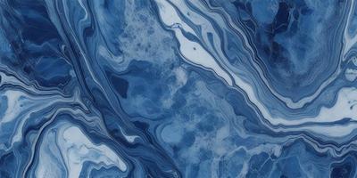 The primary subject of the image is a blue and white marbled surface, which appears to be a piece of art or a decorative item. The setting is a room with a blue and white color scheme, which complements the artwork. The visual style is a close-up of the marbled surface, showcasing its intricate patterns and textures. The colors and mood of the image are predominantly blue and white, creating a serene and elegant atmosphere.