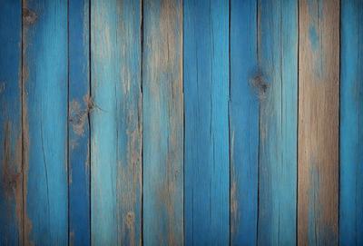 The primary subject of the image is a wooden wall with blue stripes. The setting is a room with a blue and white color scheme. The visual style is a close-up of the wooden wall, showcasing the blue stripes and the texture of the wood. The colors and mood of the image are predominantly blue and white, creating a calm and serene atmosphere.