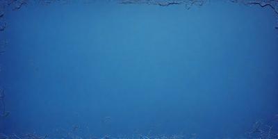 The primary subject of the image is a large, empty blue sky. The setting is a clear, cloudless day, with no visible landmarks or objects. The visual style is a close-up of the sky, showcasing its vastness and tranquility. The colors and mood of the image are predominantly blue, creating a serene and peaceful atmosphere.