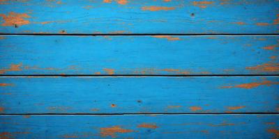 The primary subject of the image is a wooden surface with a blue color. The setting is a wooden wall, and the visual style is a photo. The dominant colors are blue and orange, creating a vibrant and lively atmosphere.
