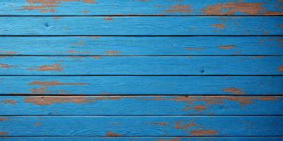 The primary subject of the image is a blue wooden wall. The setting is a room with a blue wooden wall, and the visual style is a photo. The dominant colors are blue and white, creating a calm and serene atmosphere.