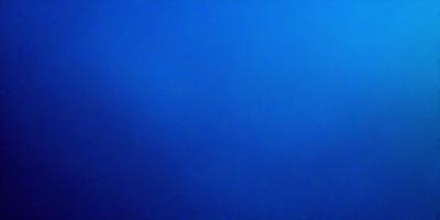 The primary subject of the image is a large body of blue water. The setting is a vast, open ocean with no visible land or other objects. The visual style is a realistic representation of the ocean, with no indication of digital art or illustration. The dominant colors are blue and white, creating a serene and calming atmosphere.