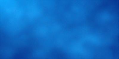 The primary subject of the image is a blue sky with a few clouds. The setting is a vast, open space with no visible landmarks or objects. The visual style is a natural, outdoor scene. The colors and mood are predominantly blue, creating a calm and serene atmosphere.