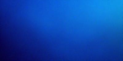 The primary subject of the image is a large body of blue water. The setting is a vast, open ocean with no visible land or other objects. The visual style is a realistic representation of the ocean, with no indication of digital art or illustration. The dominant colors are blue and white, creating a serene and calming atmosphere.