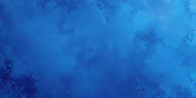 The primary subject of the image is a blue sky with clouds. The setting is a cloudy blue sky, and the visual style is a photo. The dominant colors are blue and white, creating a calm and serene atmosphere.